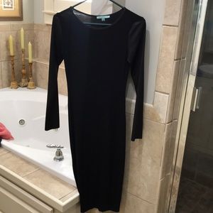 Black sheath dress with faux leather sleeves
